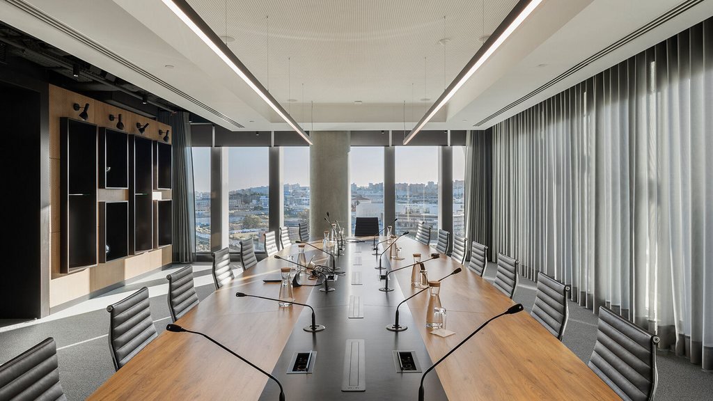 A boardroom office in Lisbon, Portugal, where fiscal representatives handle Finanças letters and deadlines for non-resident clients