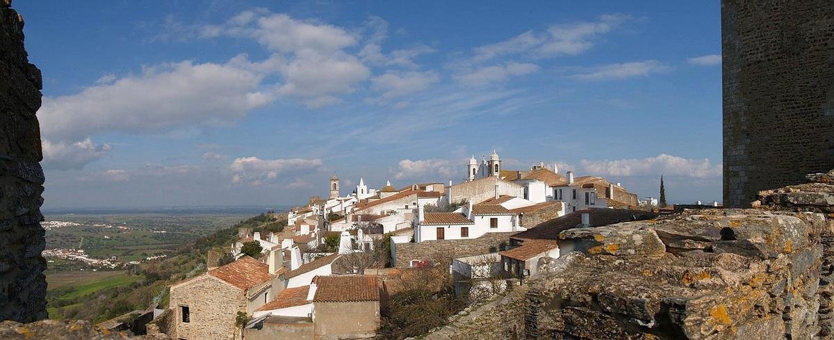 Whitewashed homes in the hilltop village of Monsaraz in the Alentejo, Portugal, where many people keep a home for part of the year
